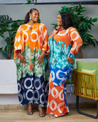 Discover trendy African clothing from CUMO London. This multicoloured V neckline African print Kaftan boubou is handmade featuring frill sleeves. One size fits all African boubou in vibrant bold colour  African Print Cover-ups Beach Tunics - Dashiki Kaftan Beach Dress |Boubou dress| African maxi gown| African kaftan | African bubu | African boubou | Midi Kaftan Bubu | African Maxi dresses | 