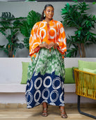 Discover trendy African clothing from CUMO London. This multicoloured V neckline African print Kaftan boubou is handmade featuring frill sleeves. One size fits all African boubou in vibrant bold colour  African Print Cover-ups Beach Tunics - Dashiki Kaftan Beach Dress |Boubou dress| African maxi gown| African kaftan | African bubu | African boubou | Midi Kaftan Bubu | African Maxi dresses | 