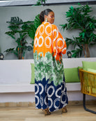 Discover trendy African clothing from CUMO London. This multicoloured V neckline African print Kaftan boubou is handmade featuring frill sleeves. One size fits all African boubou in vibrant bold colour  African Print Cover-ups Beach Tunics - Dashiki Kaftan Beach Dress |Boubou dress| African maxi gown| African kaftan | African bubu | African boubou | Midi Kaftan Bubu | African Maxi dresses | 